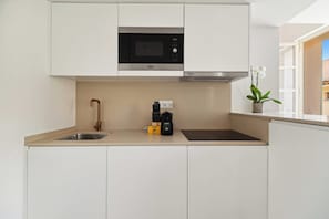 Apartamento | Cozinha privada | Cadeirão de bebê