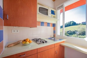 Appartement | Cuisine privée | Chaise haute