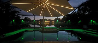 Relax in my calm and stylish space. Enjoy the relaxing lakeview and heated pool.