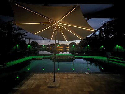 Relax in my calm and stylish space. Enjoy the relaxing lakeview and heated pool.