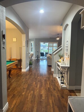 Games room - Relax in my calm and stylish space. Enjoy the relaxing lakeview and heated pool. (Riverview)
