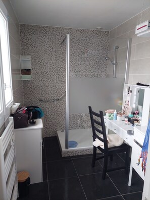 Shower, hair dryer, towels, soap