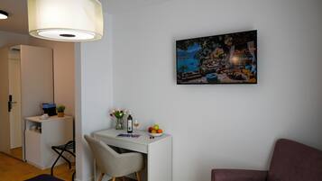 Classic Double Room, Partial Ocean View | In-room safe, desk, laptop workspace, blackout drapes