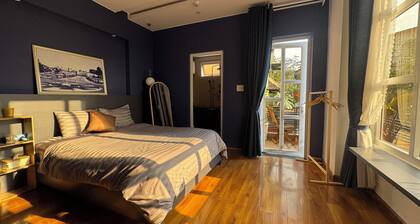 Sunny doubled-balcony hotel suites in the spacious and cozy villa