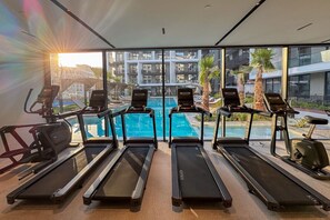 Fitness facility - Chic Retreat 1Bedroom with Pool view (Dubai)