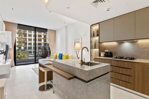 Fridge, microwave, oven, stovetop - Chic Retreat 1Bedroom with Pool view (Dubai)