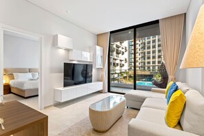 TV, ping pong - Chic Retreat 1Bedroom with Pool view (Dubai)