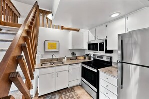 Fridge, microwave, stovetop, coffee/tea maker