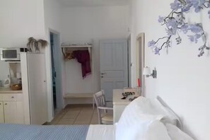 1 habitación, tabla de planchar con plancha, wifi y ropa de cama 