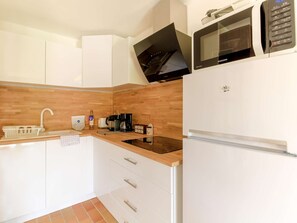 Fridge, microwave, coffee/tea maker, toaster