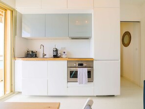 Fridge, microwave, dishwasher, coffee/tea maker
