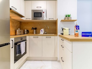 Fridge, microwave, oven, dishwasher