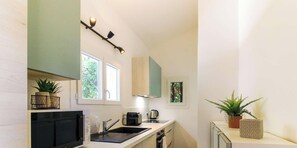 Fridge, microwave, dishwasher, coffee/tea maker