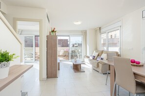 Apartment | Living room - Elegant Penthouse Stay Near the Sea (Roses)