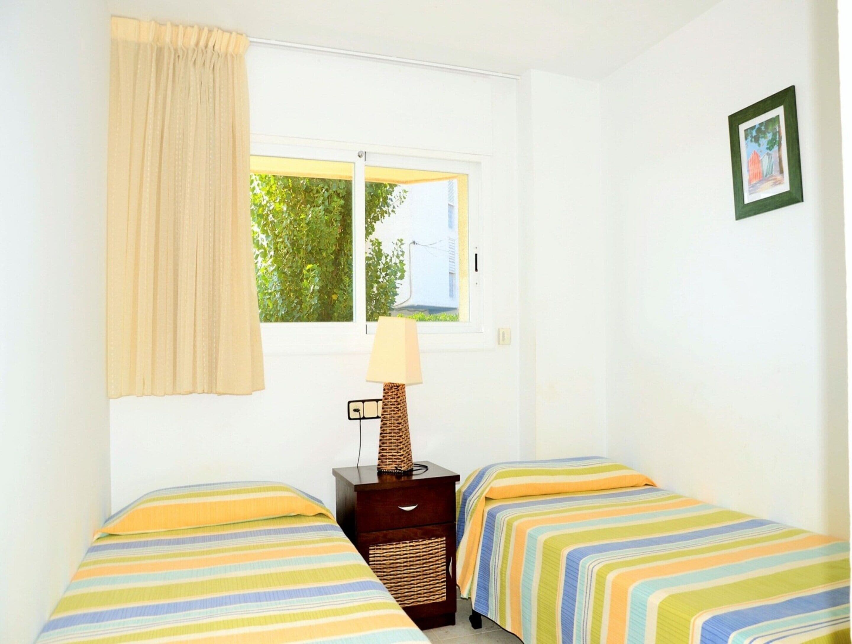 Apartamento | 3 dormitorios y tabla de planchar con plancha