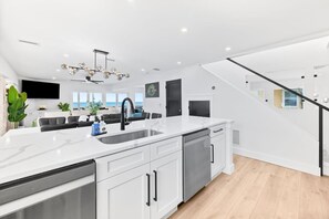 Fridge, microwave, oven, stovetop - Seaside Rose Luxury Ocean Front, Heated Pool, Hot Tub, Gameroom, Sleeps 28, Pets, Downtown (St. Augustine)