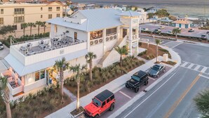 A coastal hotel with a rooftop bar, a pool, and a view of the ocean. - Gulf Place 30A! Walk to Beach! Pools! Tennis Court! (Santa Rosa Beach)
