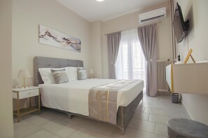 1 habitación, tabla de planchar con plancha, wifi gratis y ropa de cama