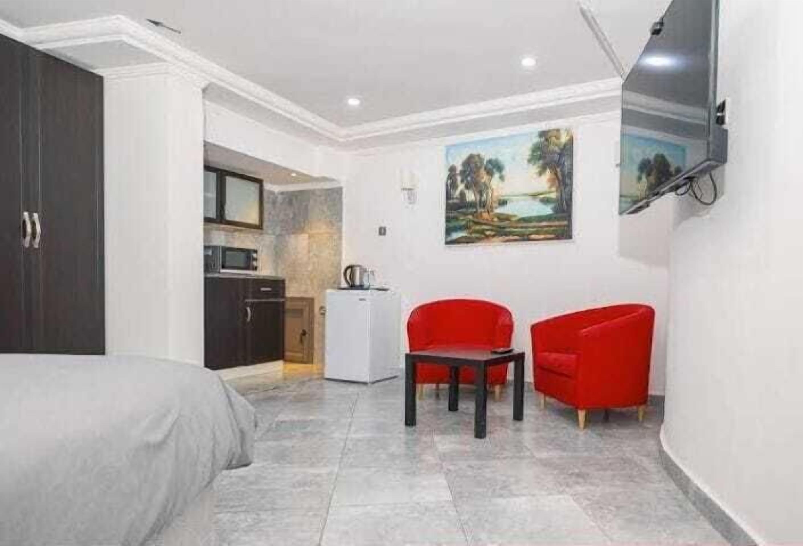 Basic Suite, City View | Iron/ironing board, free WiFi, bed sheets