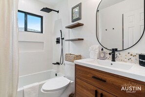 Eco-friendly toiletries, hair dryer, towels, soap