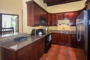 Apartment, 2 Bedrooms | Private kitchen | Fridge, coffee/tea maker, toaster