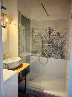 Shower, hair dryer, towels, soap