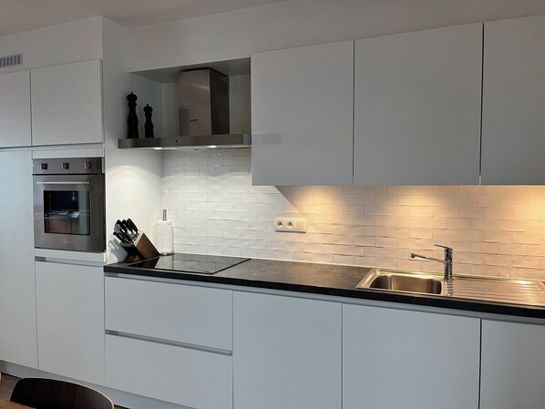 Apartamento | Cozinha privada | Cadeirão de bebê