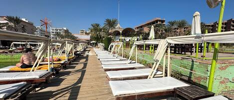 On the beach, free beach cabanas, 3 beach bars