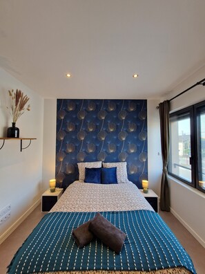 Departamento | 2 habitaciones y tabla de planchar con plancha 