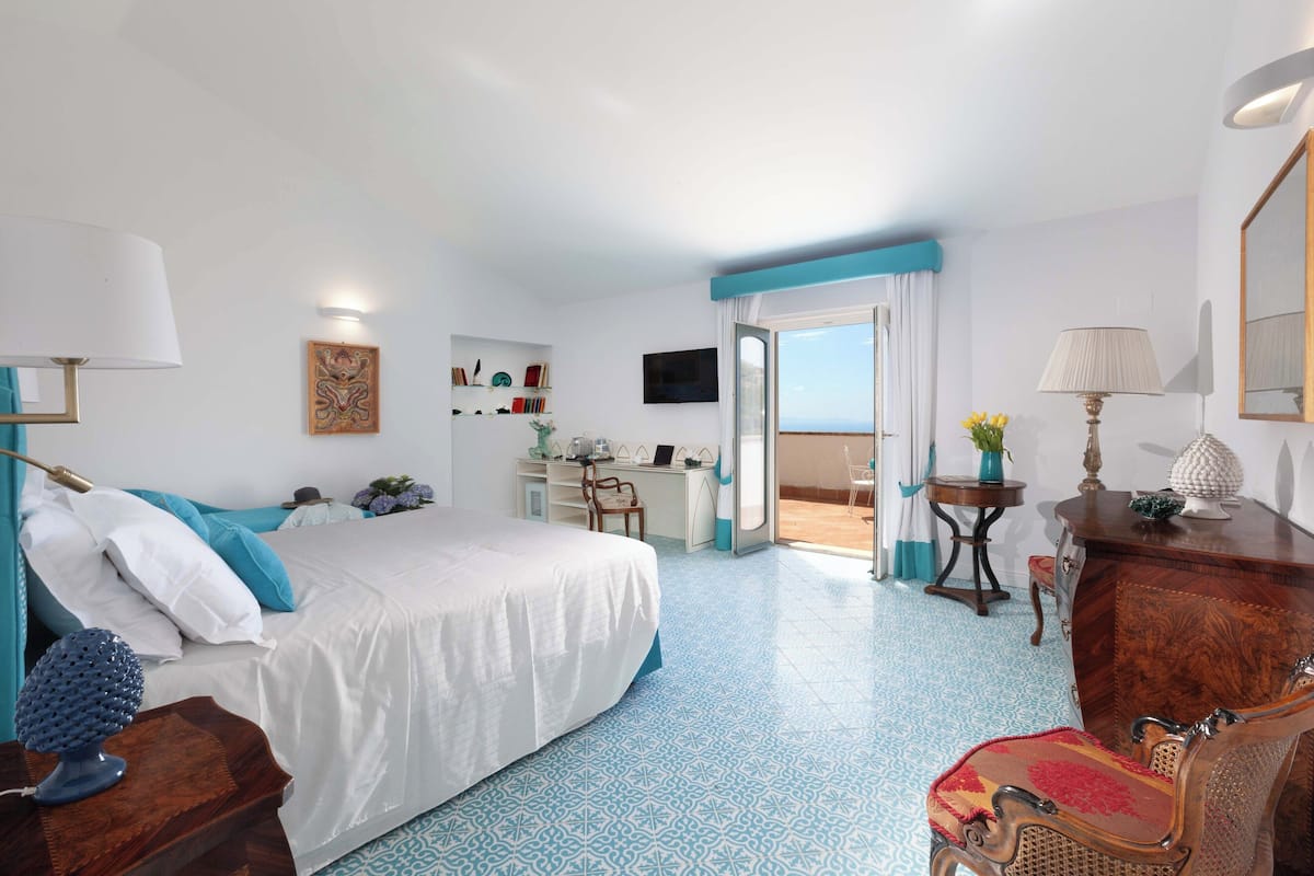 Apartment, 1 Bedroom, Smoking, Pool Access | 7 bedrooms, individually decorated, individually furnished, desk