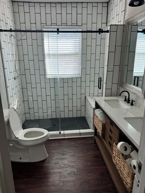 Shower, hair dryer, towels, soap