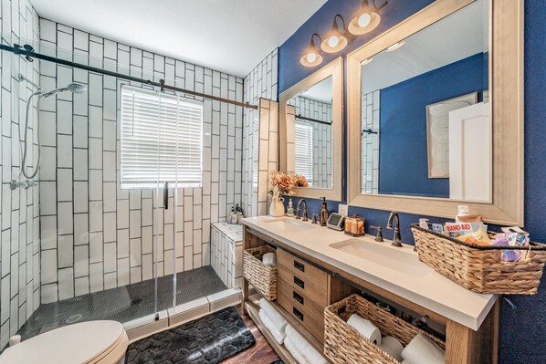 Shower, hair dryer, towels, soap