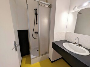 Shower, hair dryer, toilet paper