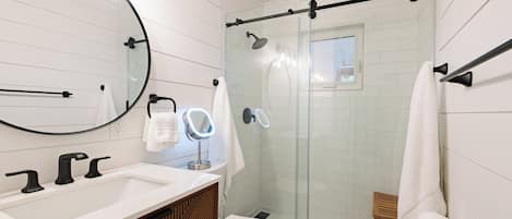 Shower, hair dryer, towels, soap