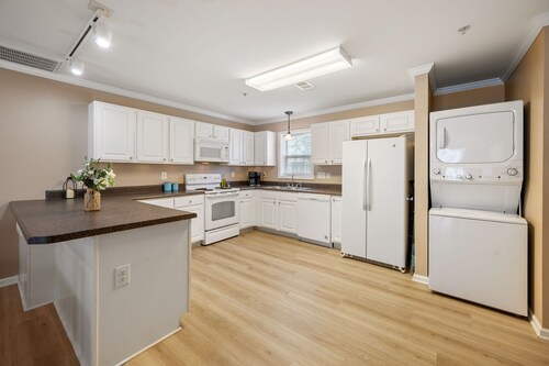 Newly Furnished!  Relax in style in this charming townhome in gated community