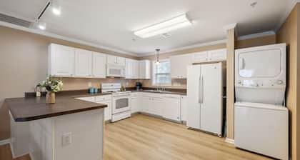 Newly Furnished! Relax in style in this charming townhome in gated community