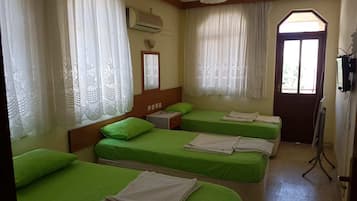 Standard Quadruple Room, Balcony, Garden View | Laptop workspace