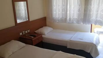 Standard Quadruple Room, Balcony, Garden View | Laptop workspace