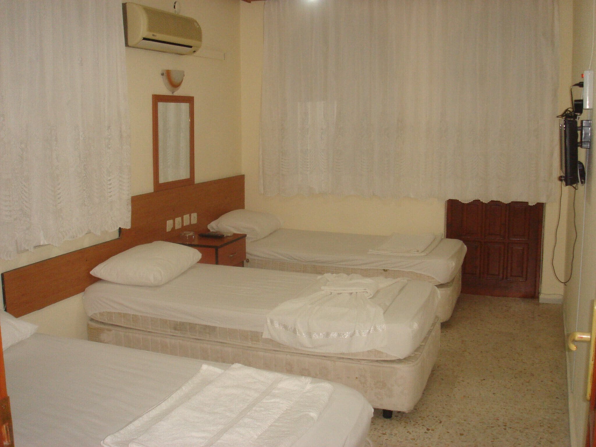 Standard Quadruple Room, Balcony, Garden View | Laptop workspace