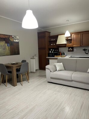 Comfort Apartment, Hill View | Living area | TV