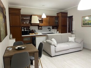 Comfort Apartment, Hill View | Living area | TV - B&B Fiume (Morino)