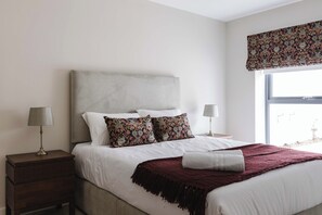 2 slaapkamers, een strijkplank/strijkijzer, reisbedje, gratis wifi