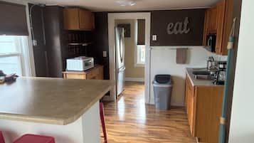 Fridge, microwave, coffee/tea maker, toaster