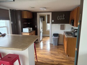 Fridge, microwave, coffee/tea maker, toaster - 4-Bdrm 3 bath house in Grafton with large patio, WiFi and very walkable. Fun!!! (Grafton)