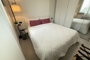 1 slaapkamer, een strijkplank/strijkijzer