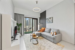 Living area -  Dreamy Apt w/ Pool Burj view 2 Min Walk to Mall (Dubai)