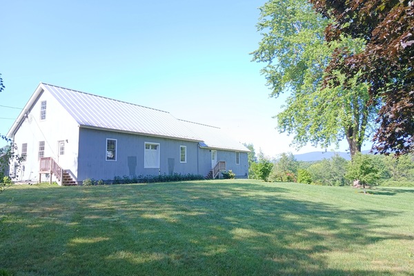 Scenic view of fields and mountains from the property