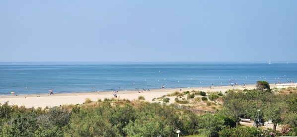 On the beach, beach towels