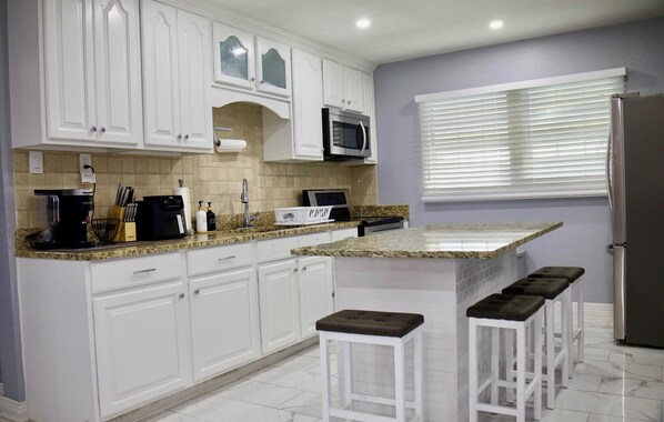 Fridge, microwave, oven, coffee/tea maker