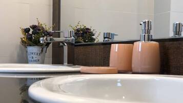 Hair dryer, towels, soap, shampoo